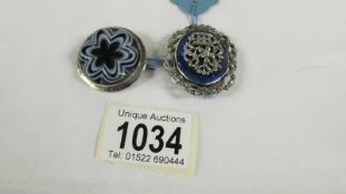 A Victorian banded agate brooch together with a cut steel and blue surround 19th century brooch.