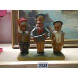 An unusual carved wood 3 piece bar set, original and in good condition.