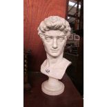 A white glazed porcelain bust.