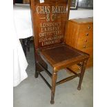 An advertising chair 'Charles Baker' incorporating a trouser press.