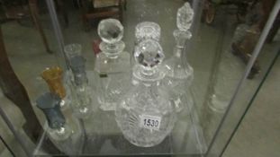 4 cut glass decanters and 6 glasses.