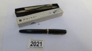 A good boxed Parker fountain pen with 14k gold nib.