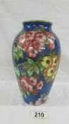 A beautiful hand painted Maling 21.5 cm tall vase. On the base is a P under the number 6273.