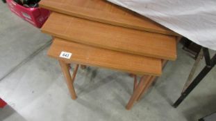 A good quality nest of 3 teak tables.