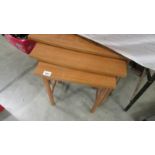 A good quality nest of 3 teak tables.