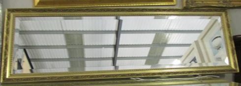 A good quality gilt framed bevel edged mirror.