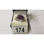 A 9ct gold white gold amethyst and diamond ring, size R.