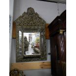 A metal framed bevel edged mirror. ****Condition report**** Late 19th century.