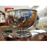 A good silver plate punch bowl with ladle.