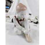 Two Quintrum Budapest porcelain figures of children together with four porcelain figures of