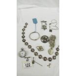 A silver fob watch, a silver bangle and further jewellery items.