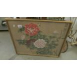 A signed framed and glazed Chinese floral picture.