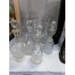 10 vintage glass decanters (9 stoppers a/f for display only).