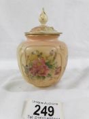 A Royal Worcester Blush Ivory lidded pot.