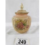 A Royal Worcester Blush Ivory lidded pot.