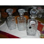 3 mid 20th century cut glass decanters, in good condition.