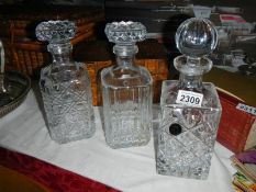 3 mid 20th century cut glass decanters, in good condition.