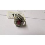 A 9ct gold garnet dress ring, size T.