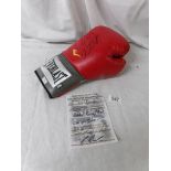 A signed Everlast red boxing glove, Riddick Bow.