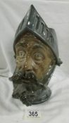 A large character jug depicting Don Quixote by G Bongera, 17 cm tall.