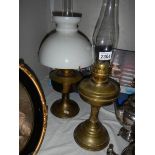An Alladin oil lamp (complete) and one other.