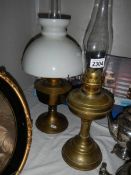 An Alladin oil lamp (complete) and one other.