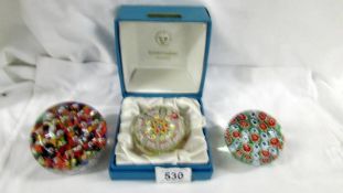 A Strathern glass millifiori paperweight and 2 others.