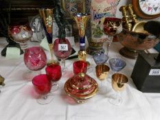 14 pieces of coloured glass, some with enamel decoration.