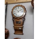 A 19th century mahogany inlaid drop dial wall clock.