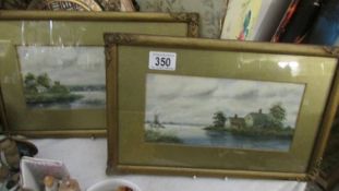 A pair of framed and glazed watercolours signed S Russell.