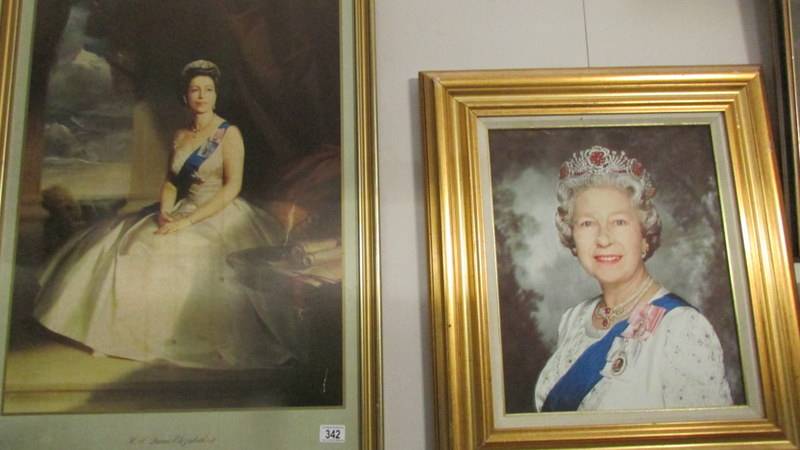 2 portrait prints of Queen Elizabeth II.