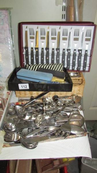 A large quantity of assorted cutlery.