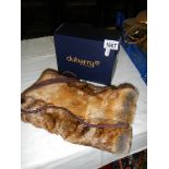 A Dubarry of Ireland faux fur muff in original box.
