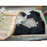 A box of miscellaneous vintage items including clergymen's items, bonnet,