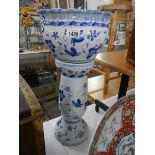 A modern Regency ironstone blue and white jardiniere on stand