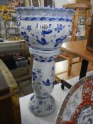 A modern Regency ironstone blue and white jardiniere on stand