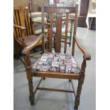 A 1930's oak carver chair
