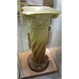 A Majolica jardiniere stand.