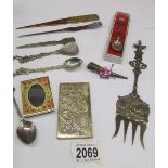 A mixed lot including letter openers, spoons, Chinese plaque etc.