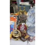 A mixed lot of brass ware including candlesticks.