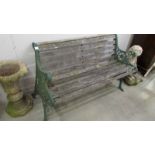 A cast iron and wood bench (needs some slats replacing).