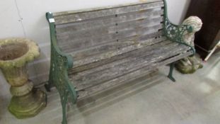 A cast iron and wood bench (needs some slats replacing).