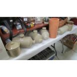4 stoneware hot water bottles and other items.