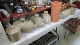 4 stoneware hot water bottles and other items.