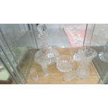 A cut glass ships decanter and 6 other cut glass items.