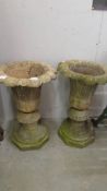 A pair of "stoneware" garden urns, a/f.