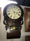 A drop dial wall clock with brass inlay