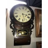 A drop dial wall clock with brass inlay