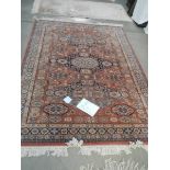 A 257 x 170 cm rug including fringe.