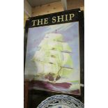 A large 'The Ship' sign.